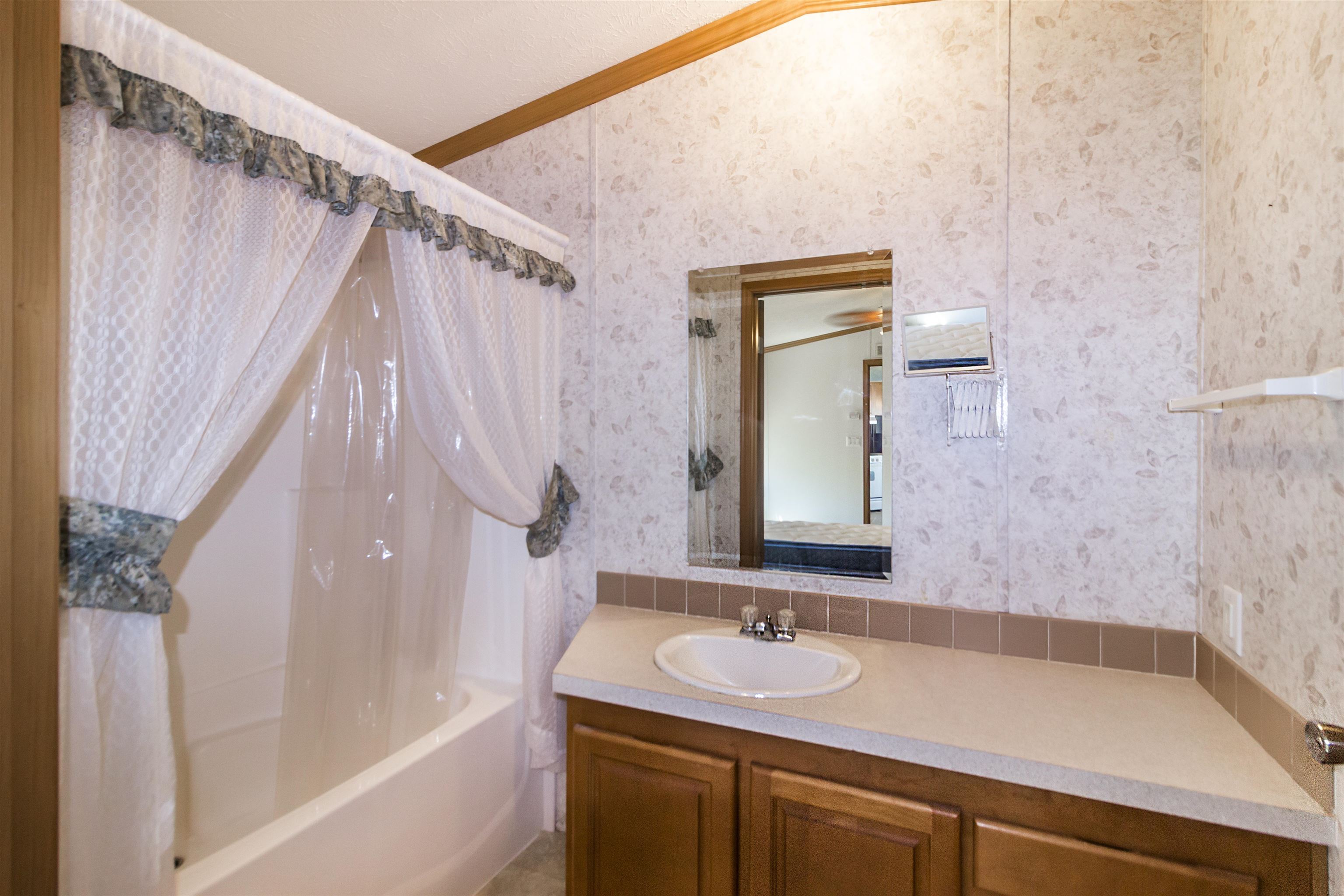 718 Lilly Pond Drive Erma, NJ 08204 - Photo 8 of 14 a bathroom with a sink and a mirror