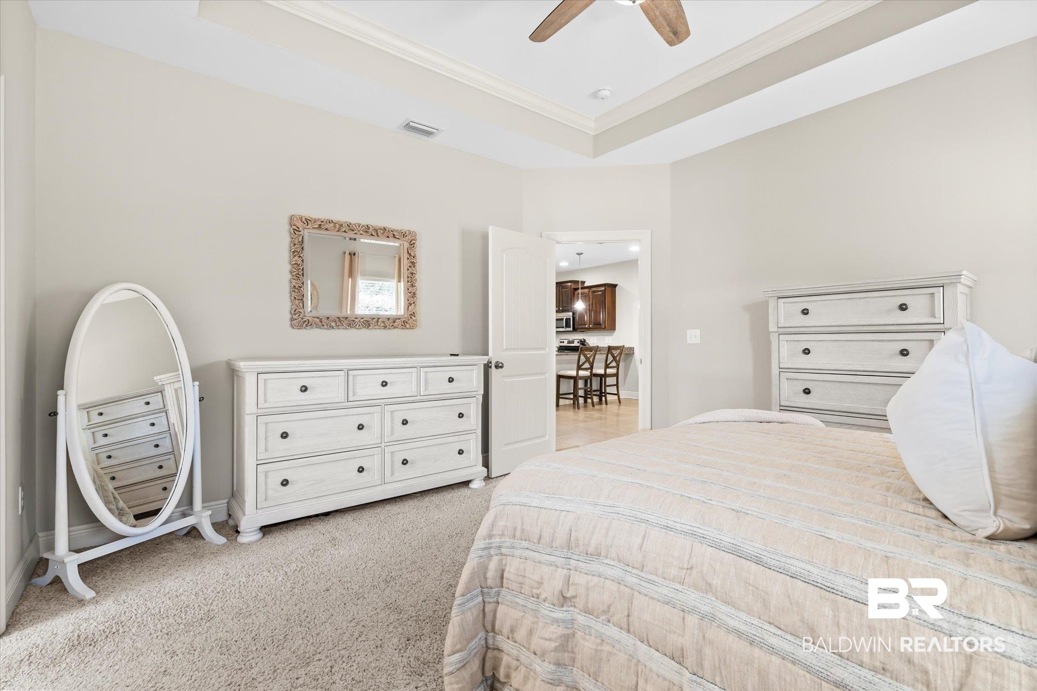 22640 Nana Loop East Silverhill, AL 36576 - Photo 8 of 46 Carpeted bedroom featuring ornamental molding, a tray ceiling, and ceiling fan