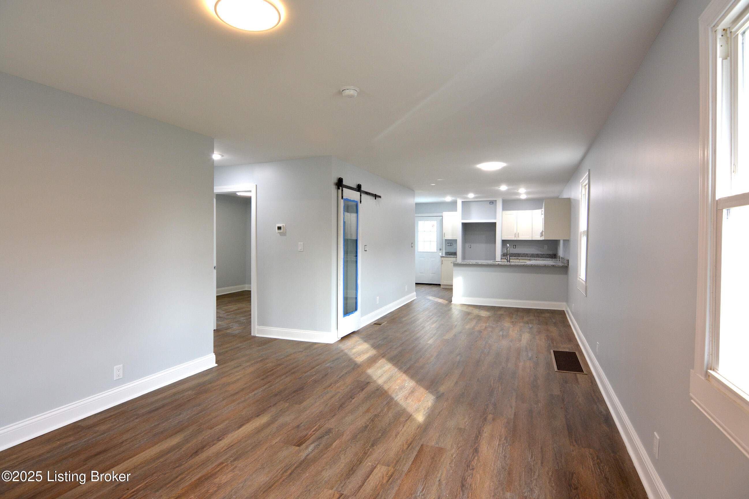 8905 Ferndale Road Louisville, KY 40291 - Photo 3 of 23 Living Room Looking Toward Kitchen