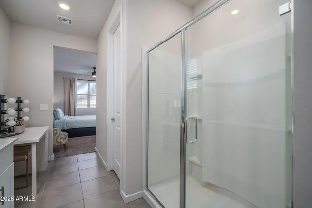 a room with a bed and television in it