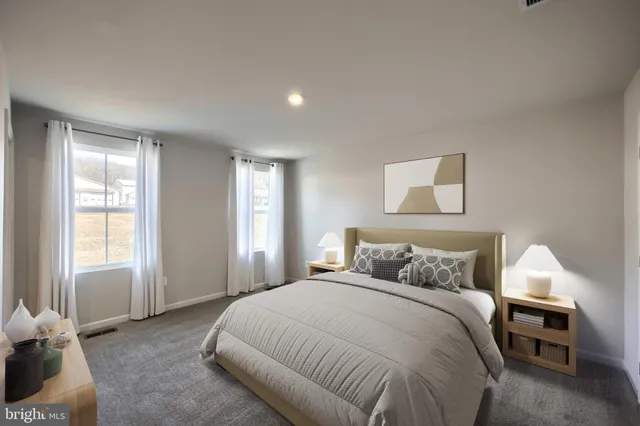 a kitchen with stainless steel appliances granite countertop sink stove top oven and cabinets