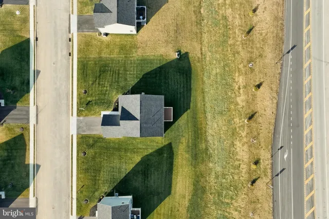 a view of a bathroom from a corridor
