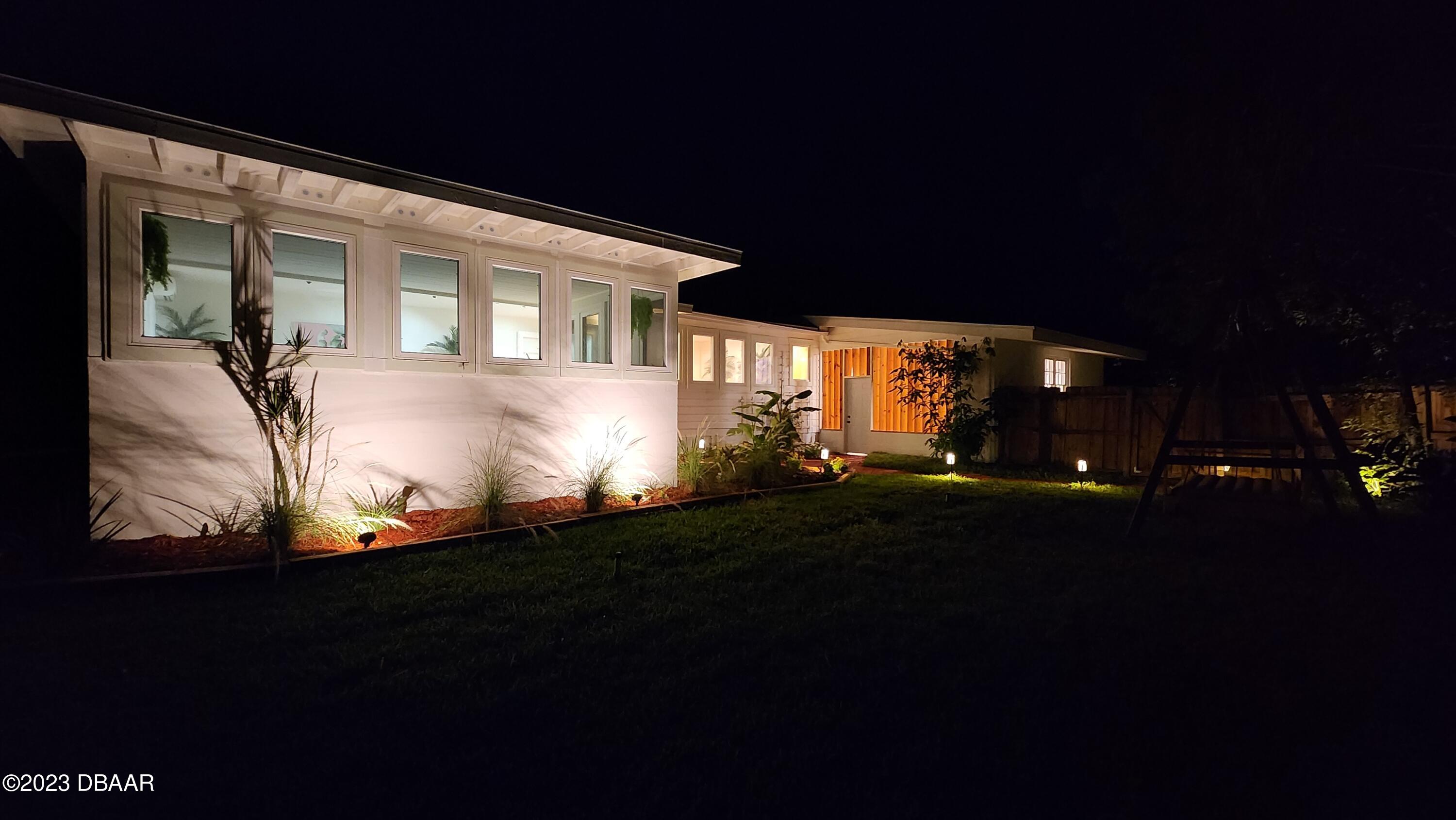 912 North Halifax Drive Ormond Beach, FL 32176 - Photo 15 of 65 a front view of a house