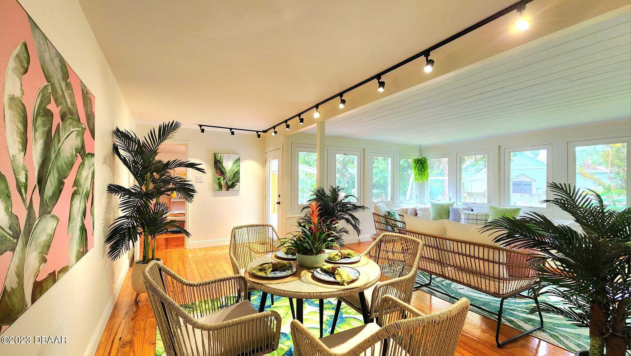 912 North Halifax Drive Ormond Beach, FL 32176 - Photo 25 of 65 a view of a dining room with furniture window and outside view