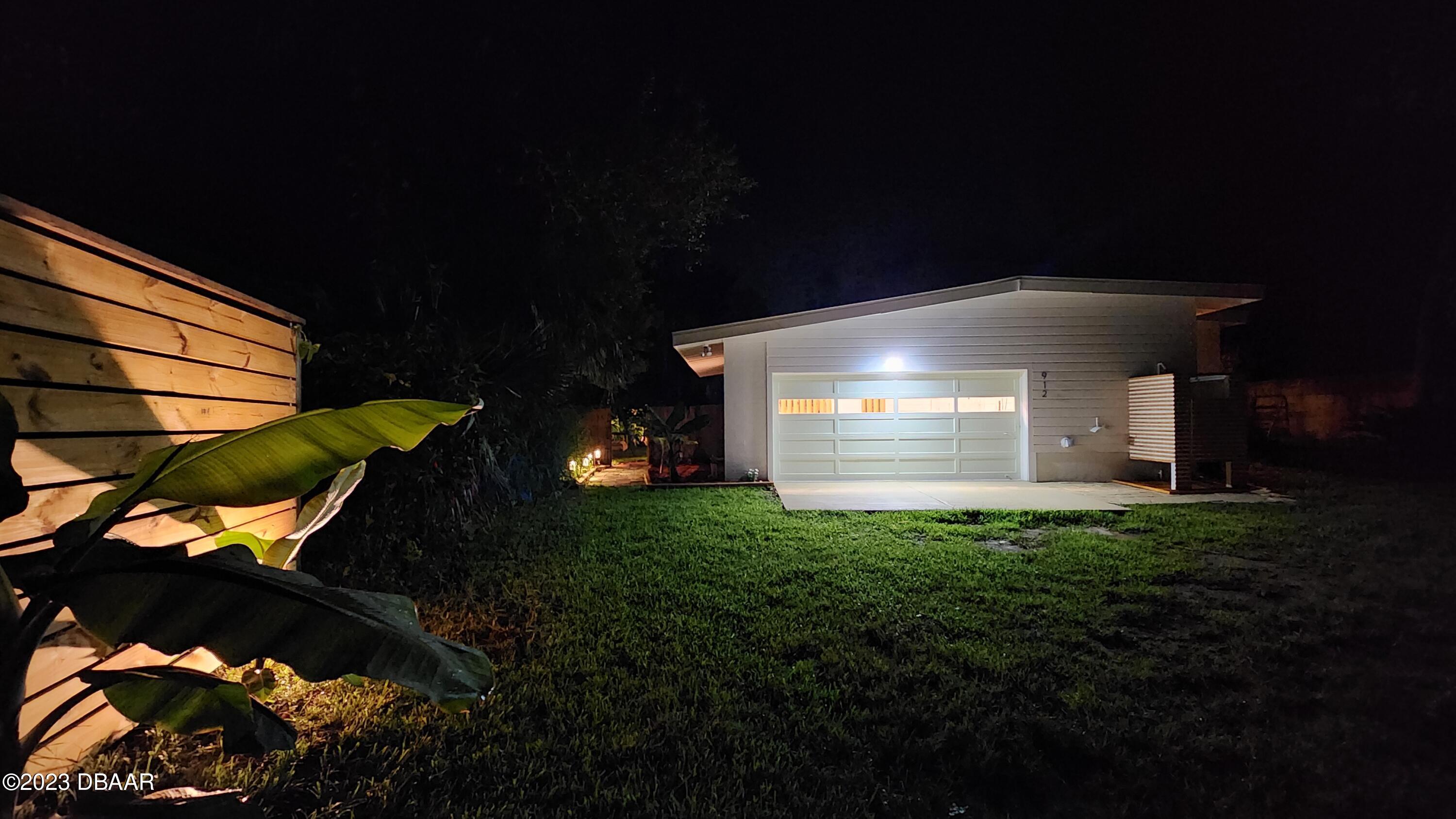 912 North Halifax Drive Ormond Beach, FL 32176 - Photo 5 of 65 a view of outdoor space and yard