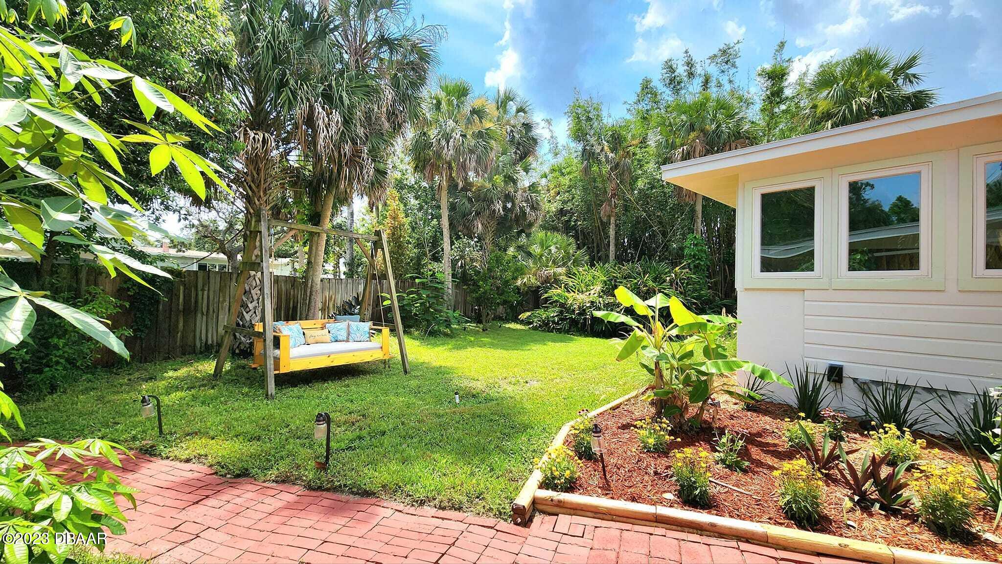 912 North Halifax Drive Ormond Beach, FL 32176 - Photo 10 of 65 Tropical plants