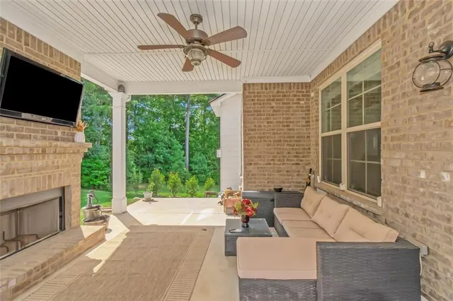 a bathroom with a sink toilet and a mirror