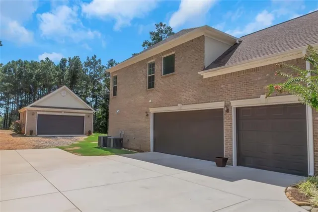 a living room with furniture a window and a fireplace