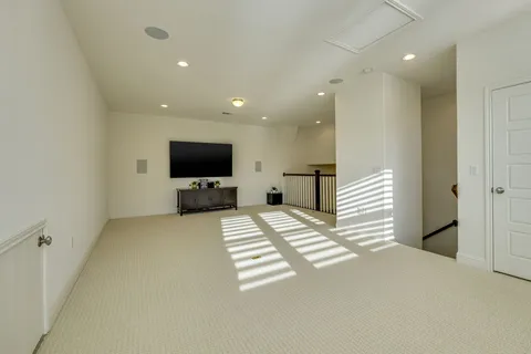 a view of a livingroom with a flat screen tv