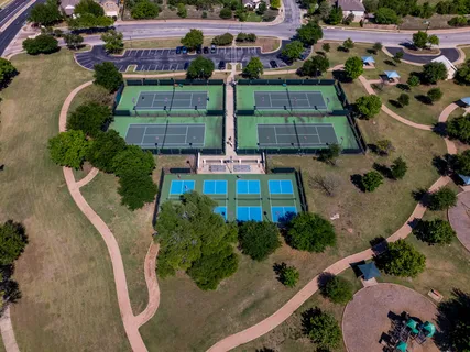 an aerial view of a houses with outdoor space