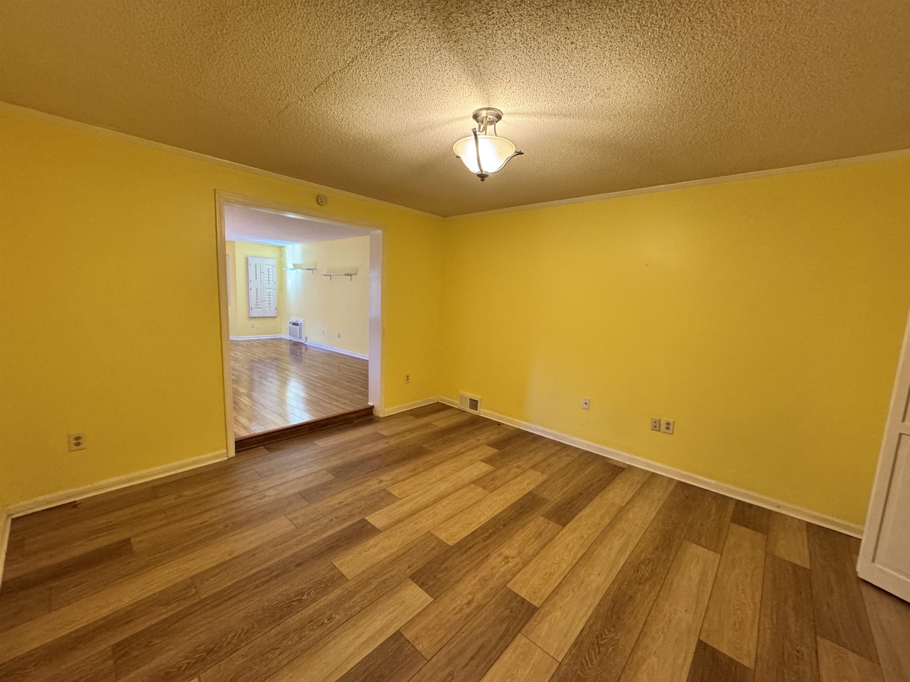 1979 Kirby Parkway Memphis, TN 38119 - Photo 15 of 28 a view of empty room with wooden floor