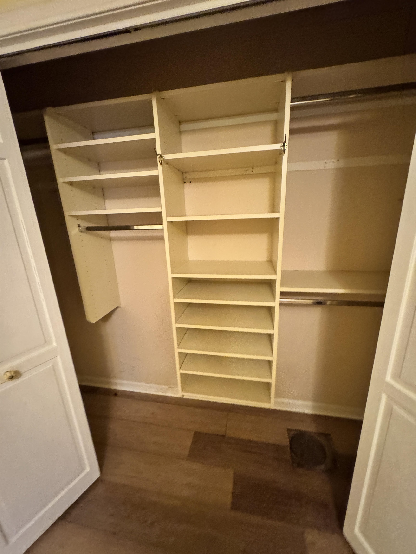 1979 Kirby Parkway Memphis, TN 38119 - Photo 16 of 28 a view of walk in closet with empty racks