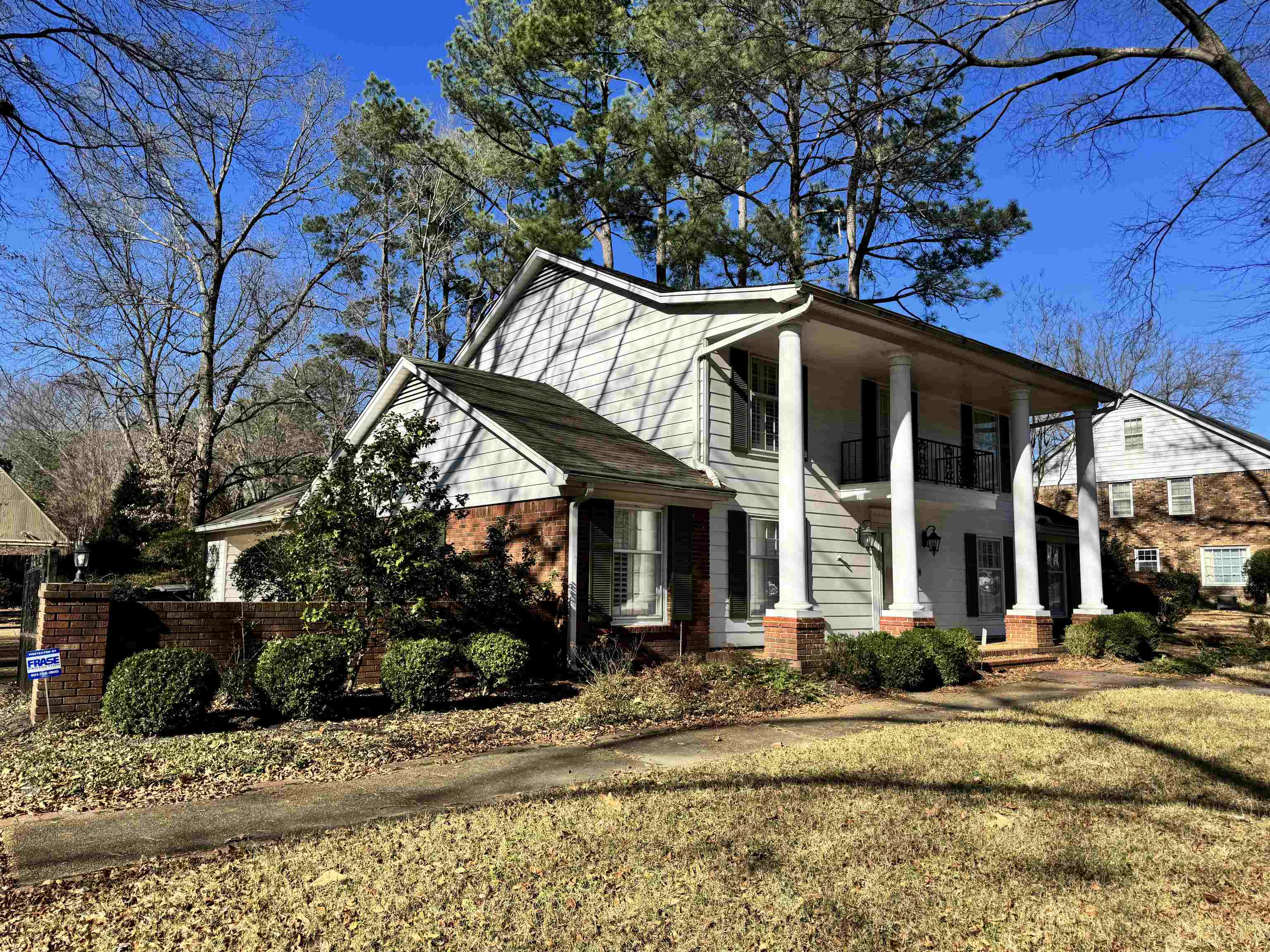 1979 Kirby Parkway Memphis, TN 38119 - Photo 3 of 28 a front view of a house with garden