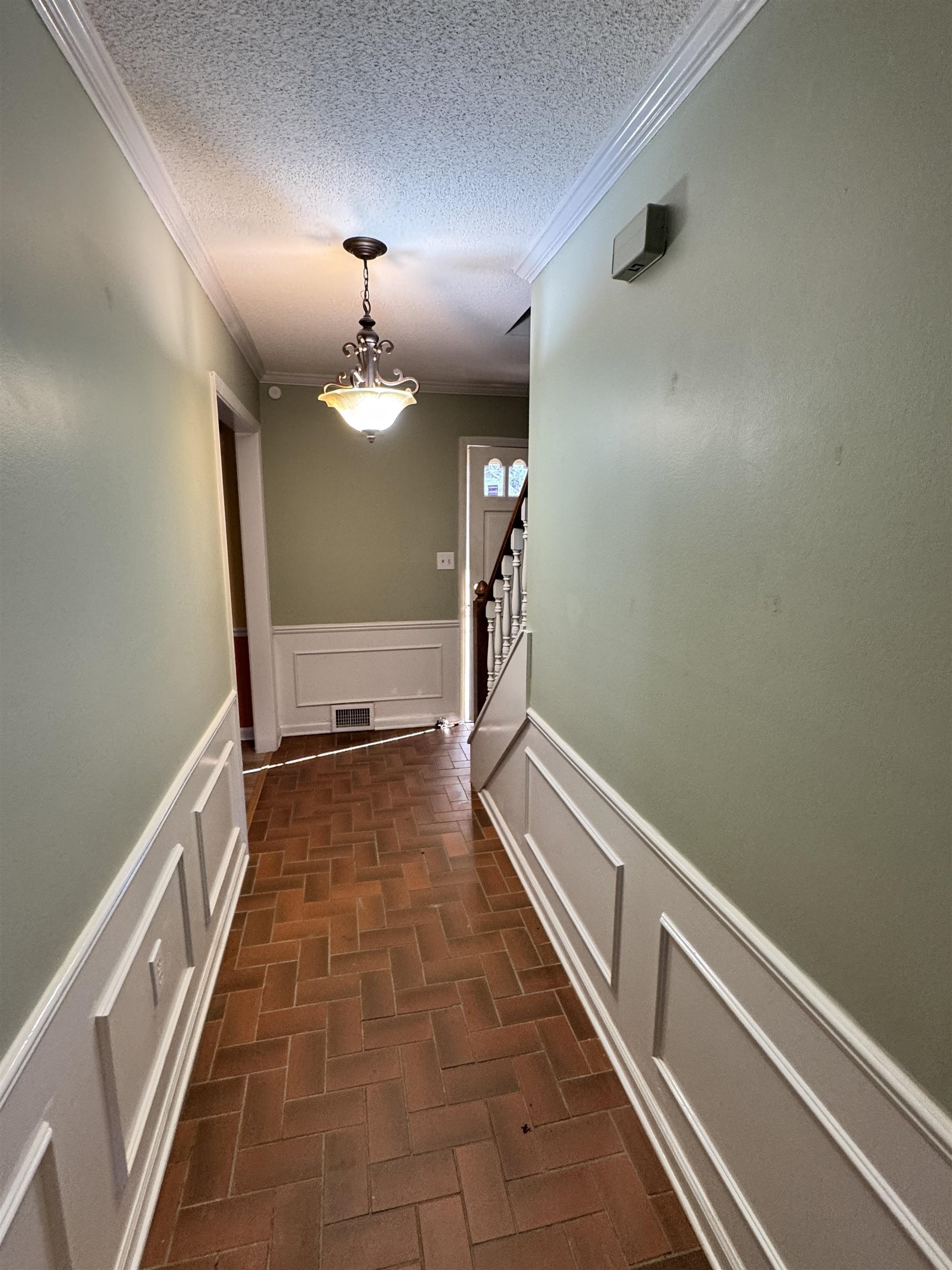 1979 Kirby Parkway Memphis, TN 38119 - Photo 4 of 28 a view of a hallway with a chandelier