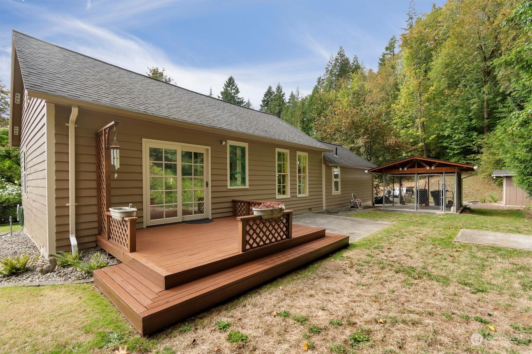 203 Don Martin Road Longview, WA 98632 - Photo 29 of 39 a view of a house with backyard and sitting area