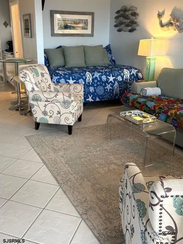 a bedroom with furniture and a bed