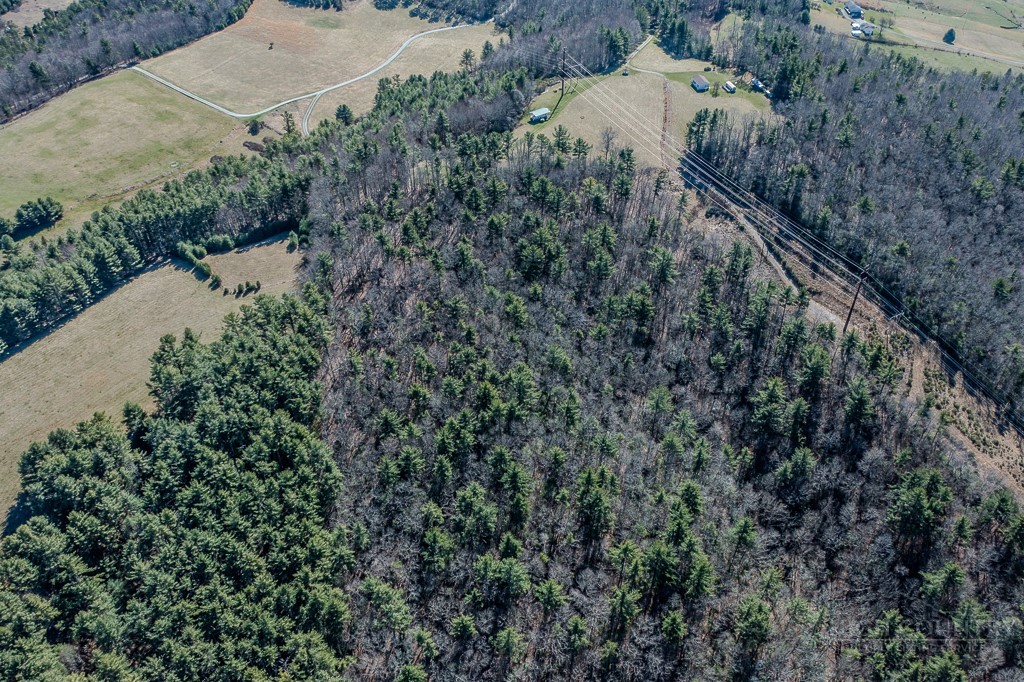 Hot Rod Road Deep Gap, NC 28618 - Photo 24 of 24 an aerial view of a house with a yard and mountain view in back