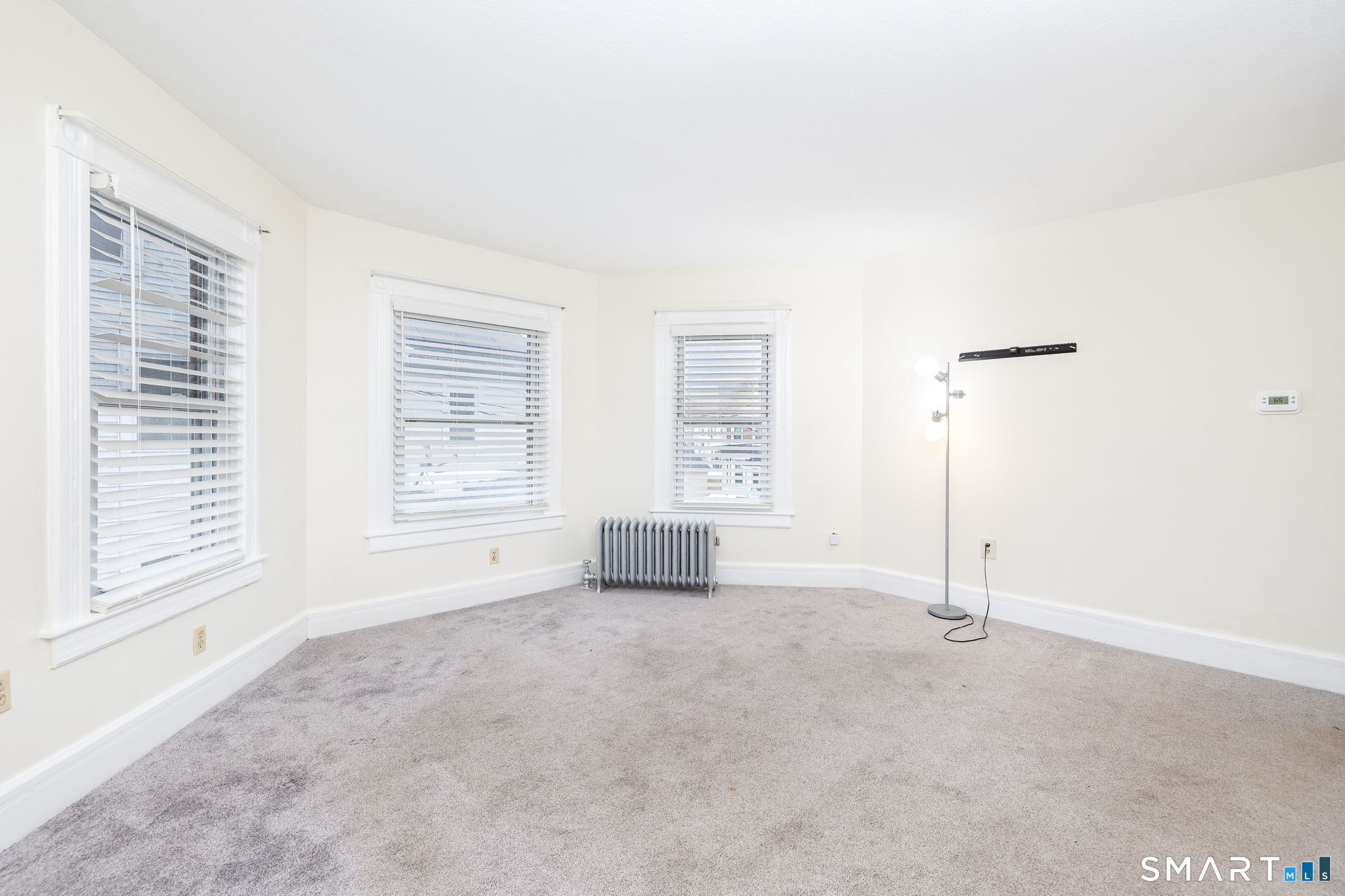 41 Walnut Street Enfield, CT 06082 - Photo 12 of 38 a view of an empty room with a window