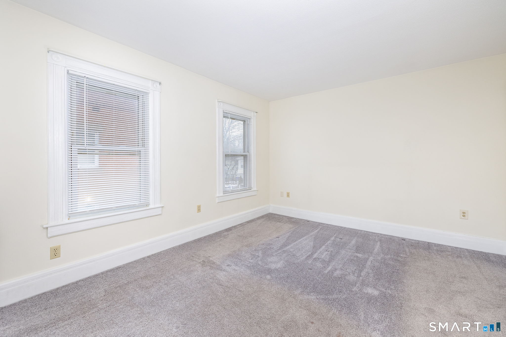 41 Walnut Street Enfield, CT 06082 - Photo 15 of 38 an empty room with windows