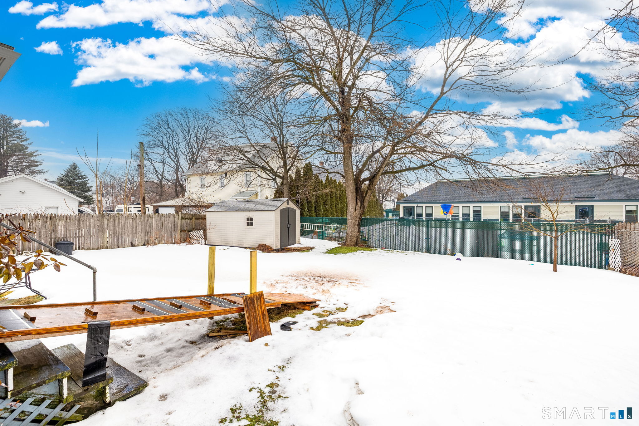 41 Walnut Street Enfield, CT 06082 - Photo 2 of 38 a street view with large trees
