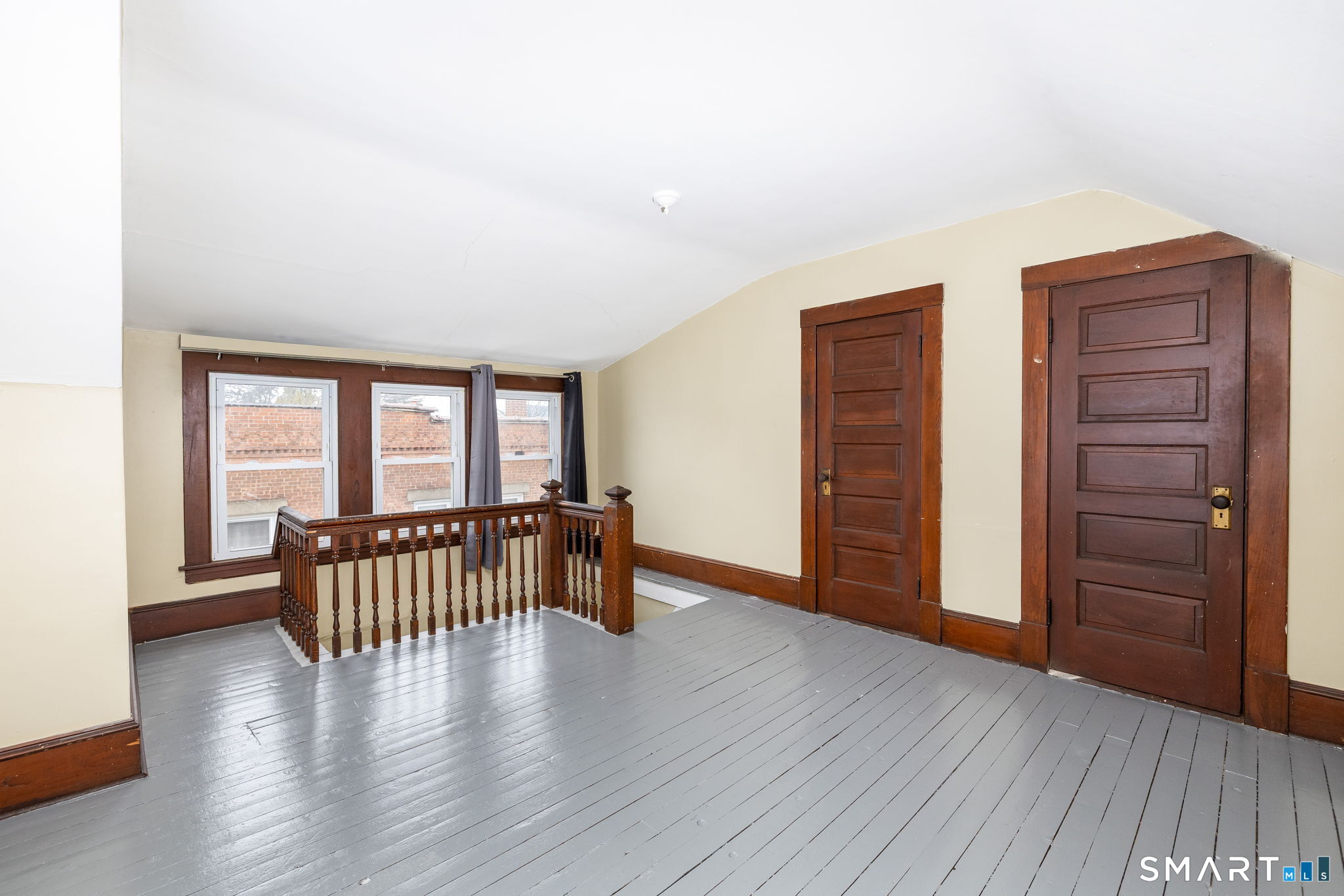 41 Walnut Street Enfield, CT 06082 - Photo 25 of 38 an empty room with furniture and wooden floor