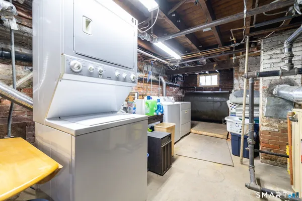 a storage room with washer and dryer