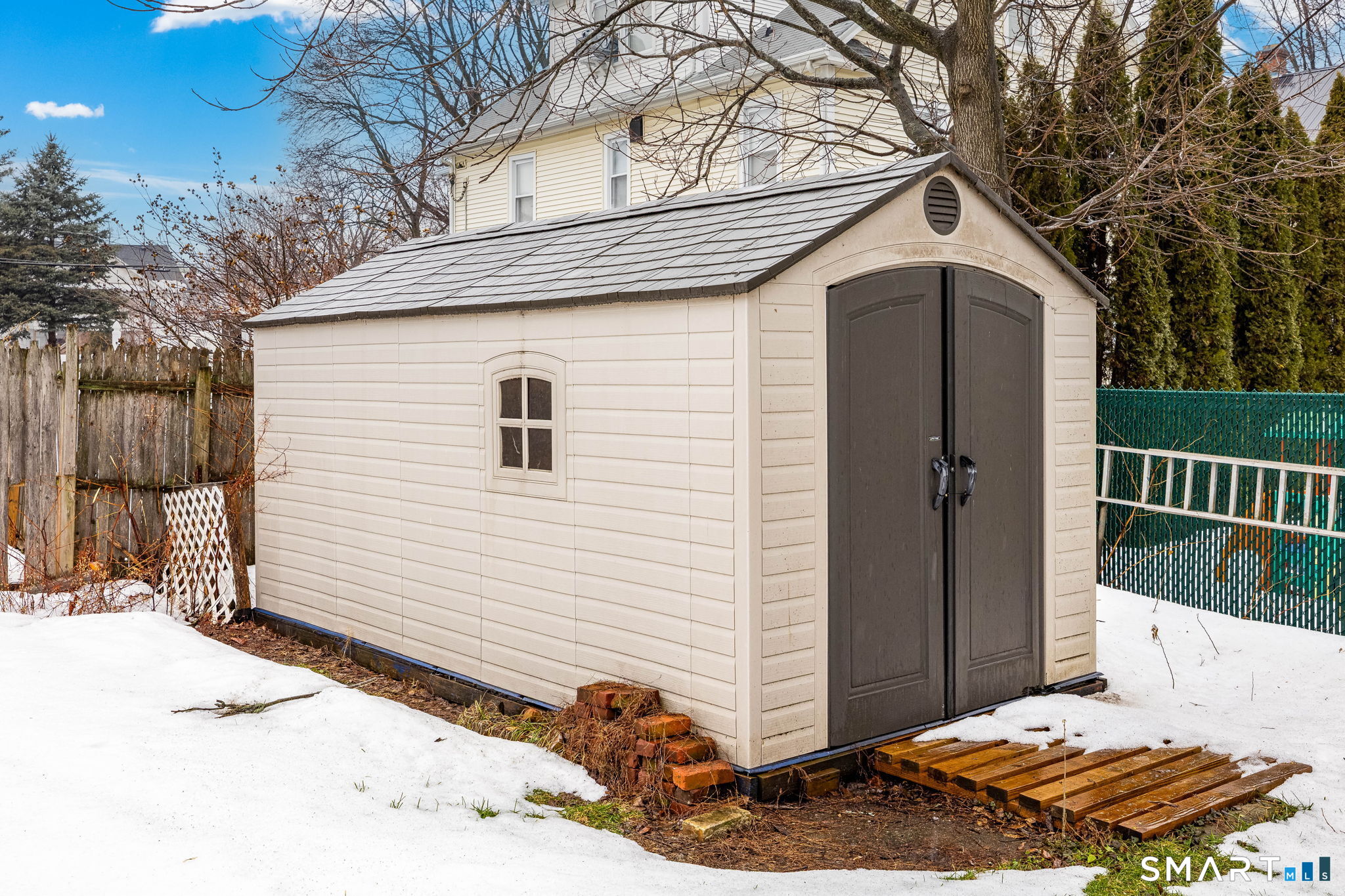 41 Walnut Street Enfield, CT 06082 - Photo 3 of 38 a view of a house with a yard