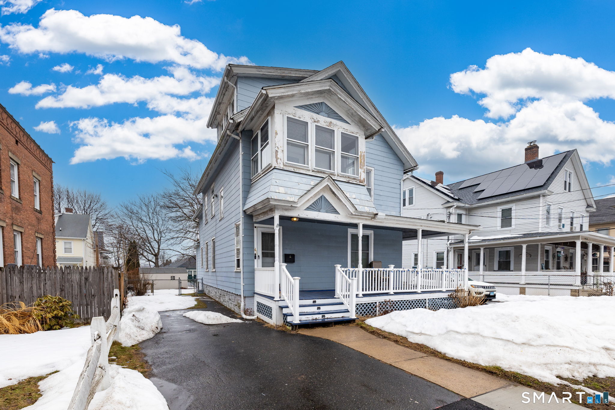 41 Walnut Street Enfield, CT 06082 - Photo 34 of 38 a front view of a house with a yard