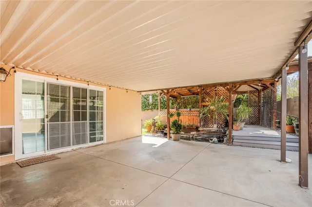 a view of front door and outdoor seating