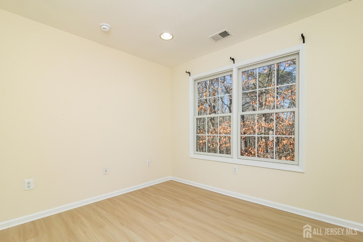 4 Timber Grove Court Old Bridge, NJ 08857 - Photo 15 of 20 a view of an empty room with a window