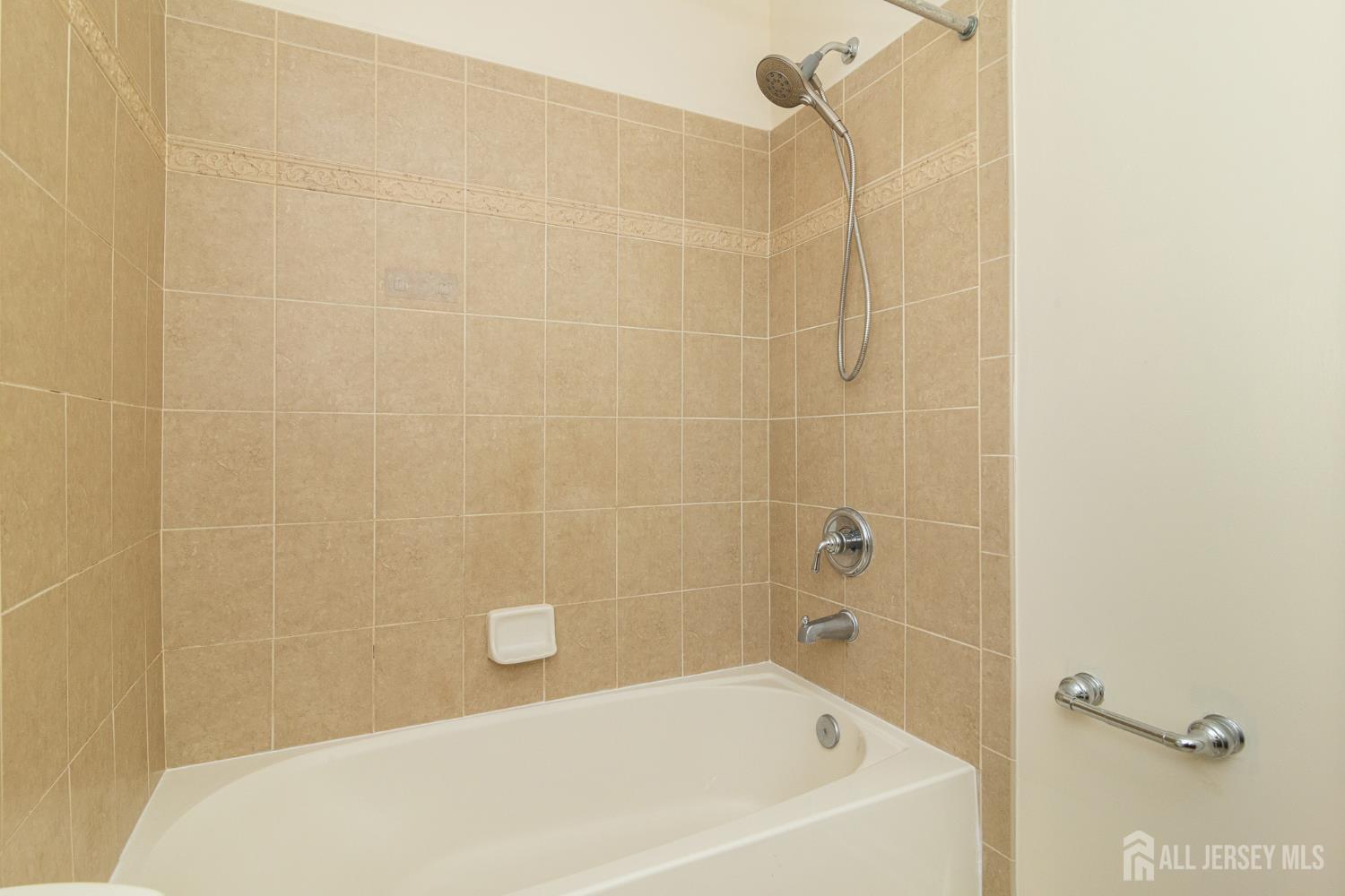 4 Timber Grove Court Old Bridge, NJ 08857 - Photo 17 of 20 a bathroom with a bathtub
