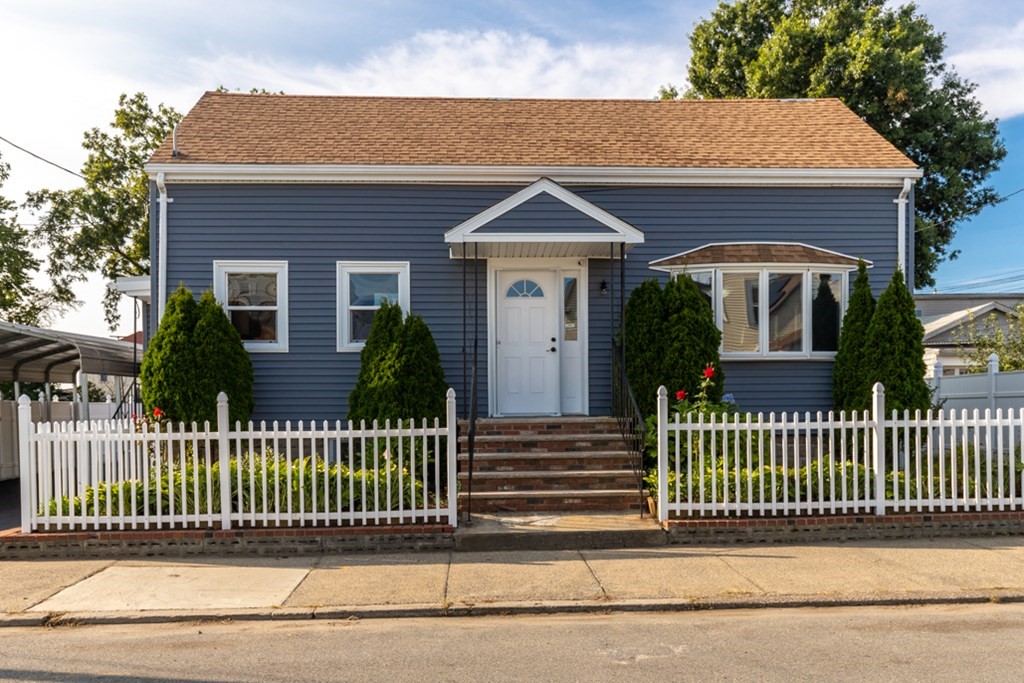 97 River Street Lynn, MA 01905 - Photo 1 of 30 a front view of a house with a deck