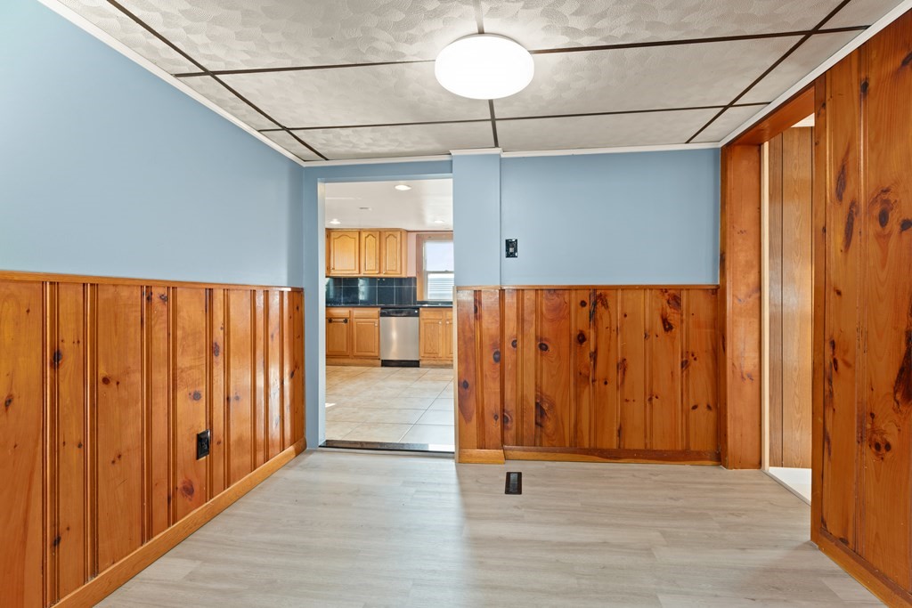 97 River Street Lynn, MA 01905 - Photo 15 of 30 an entryway with wooden floor and cabinet