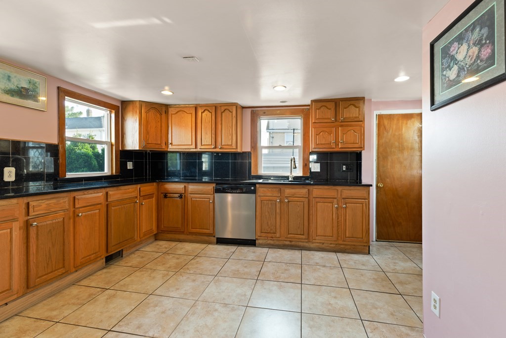 97 River Street Lynn, MA 01905 - Photo 16 of 30 a large kitchen with a large window