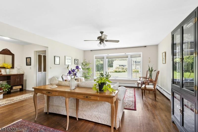 33 Carol Road Westfield, NJ 07090 - Photo 7 of 23 a view of a dining room with furniture window and wooden floor