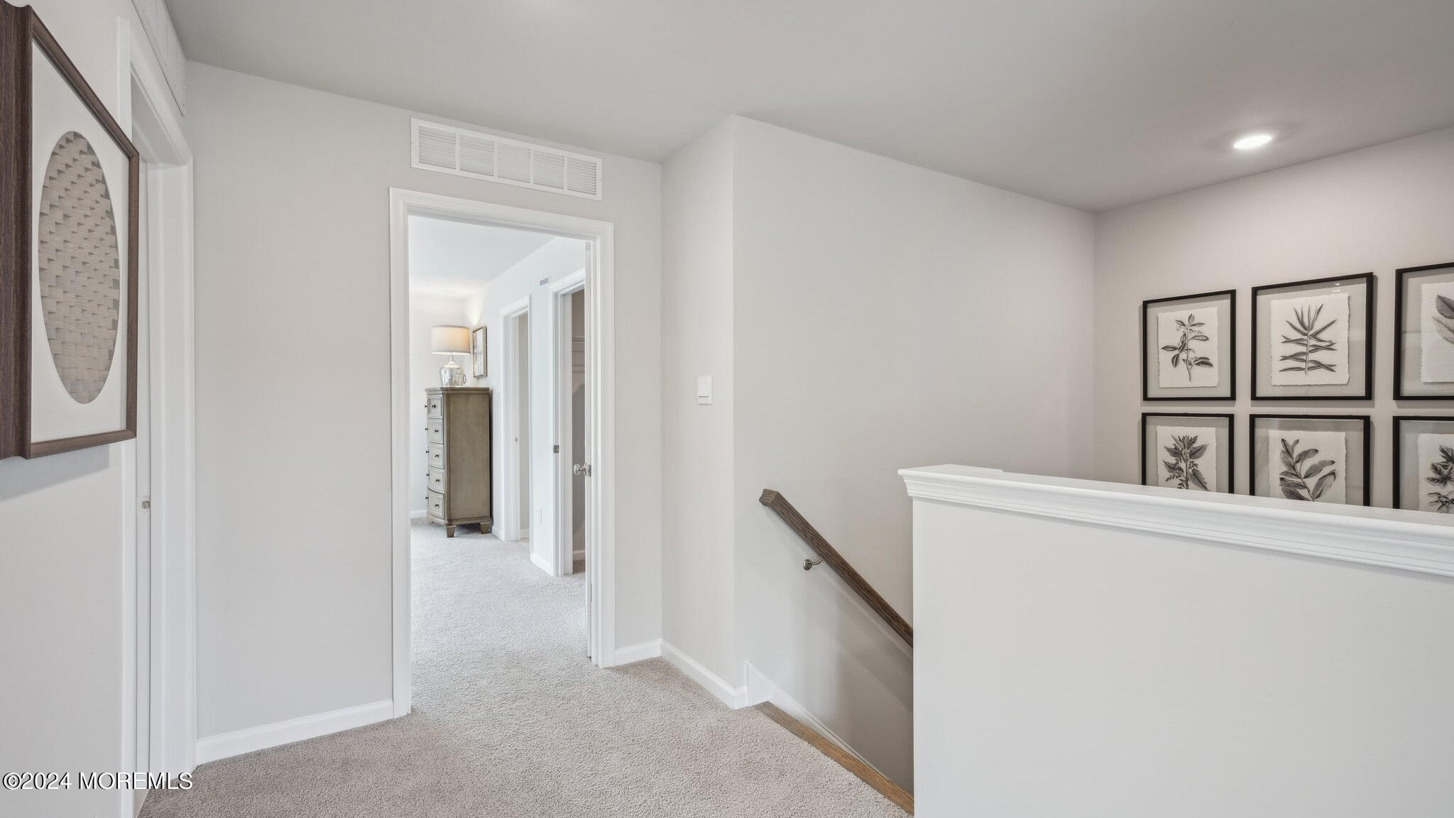 8 Rothbury Court Tinton Falls, NJ 07753 - Photo 23 of 43 a view of a hallway with windows