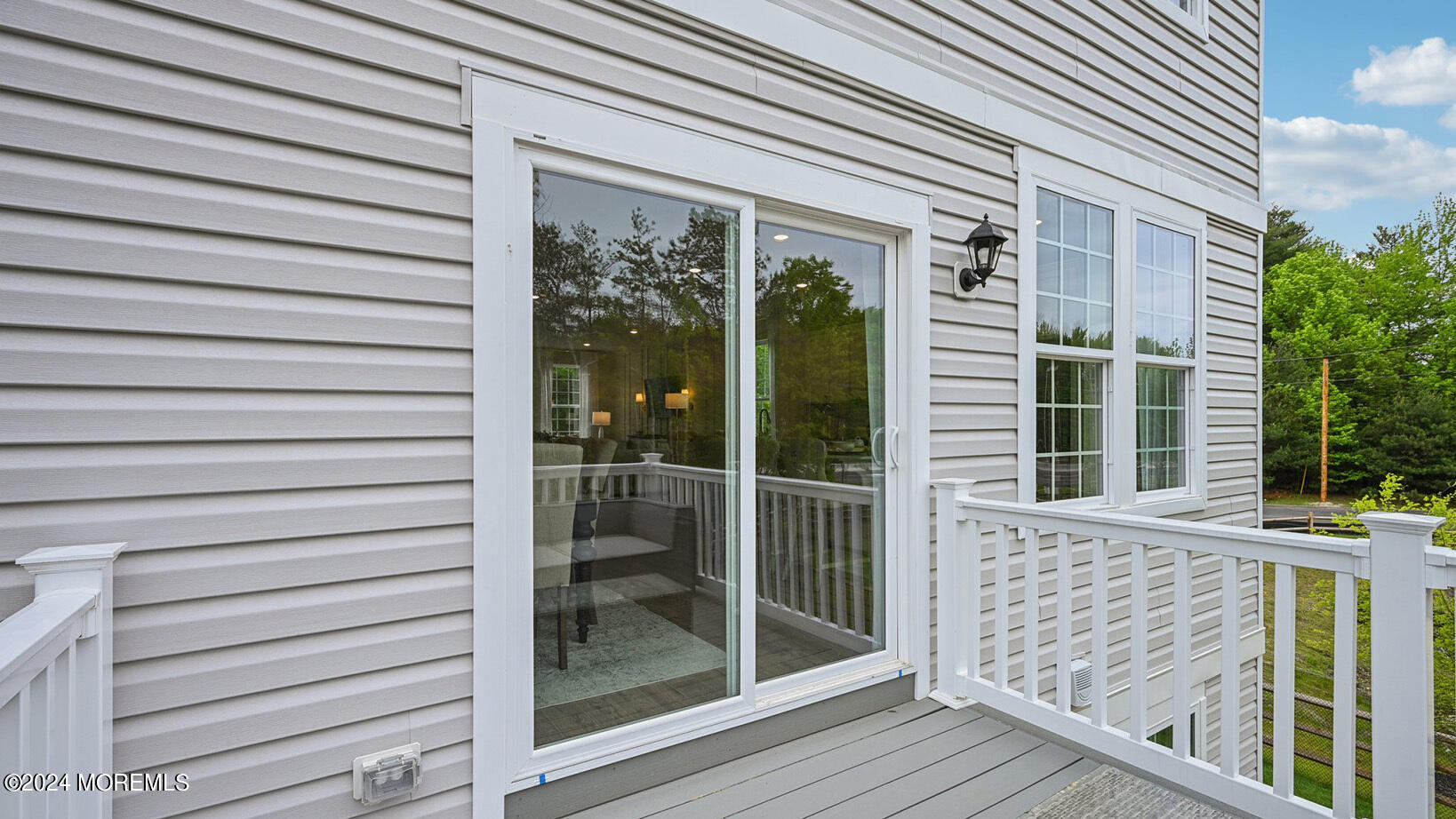 8 Rothbury Court Tinton Falls, NJ 07753 - Photo 41 of 43 a view of a porch with a door and wooden floor