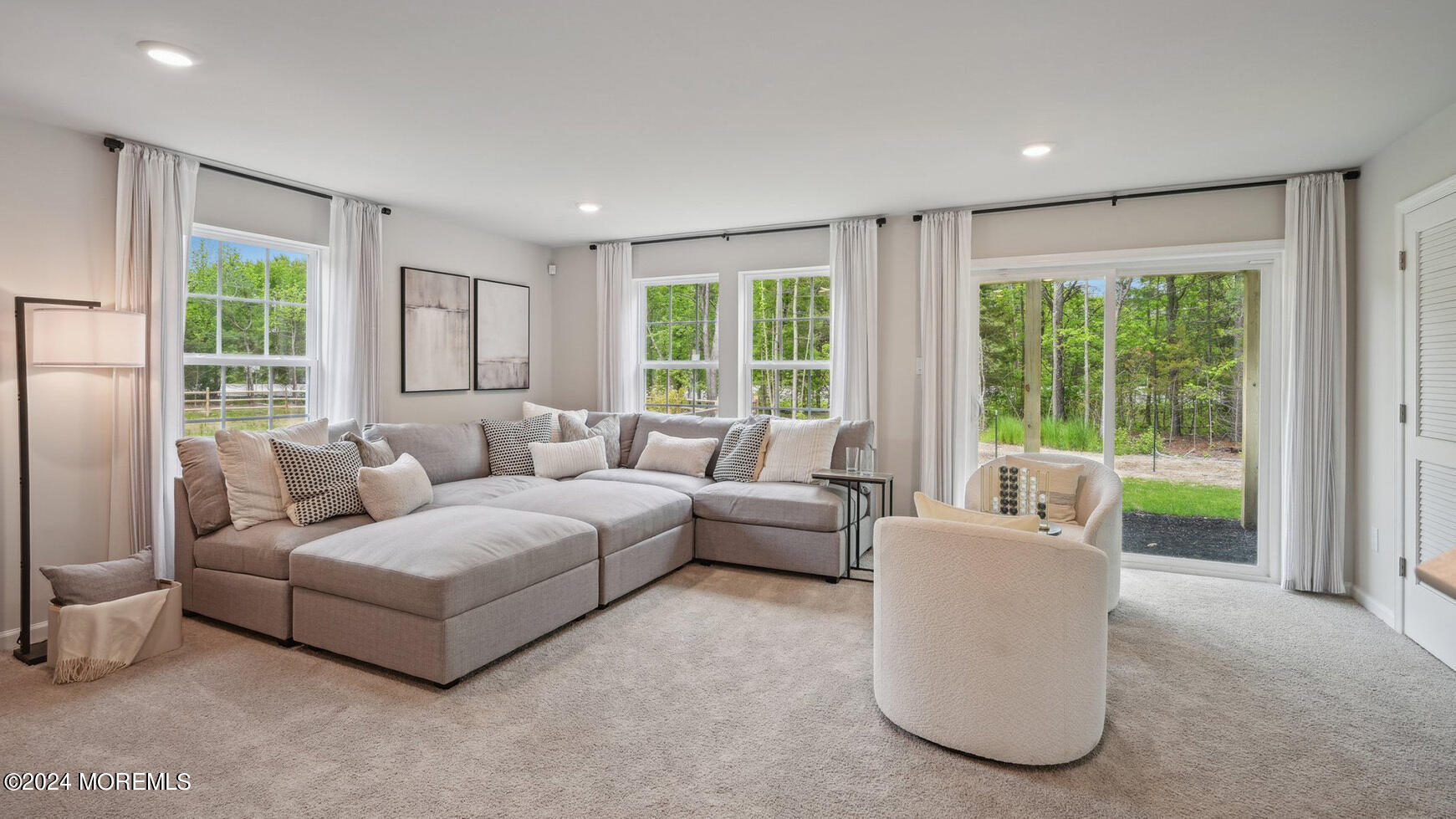 8 Rothbury Court Tinton Falls, NJ 07753 - Photo 6 of 43 a living room with furniture and a large window