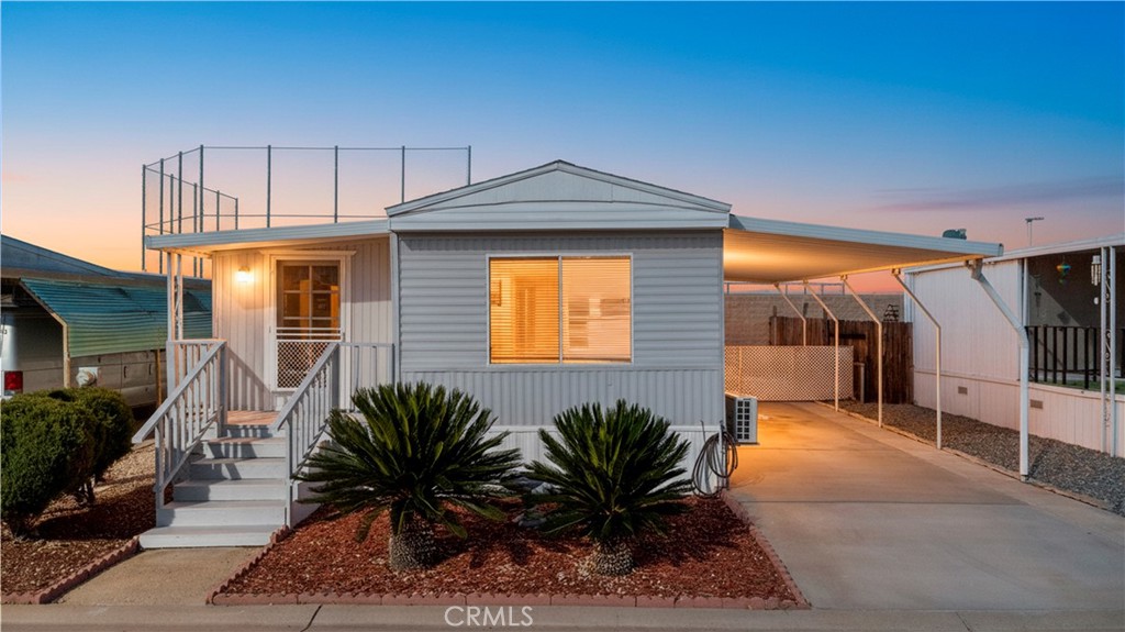 27150 Shadel Road, Unit 122 Menifee, CA 92586 - Photo 3 of 26 a house view with a outdoor space