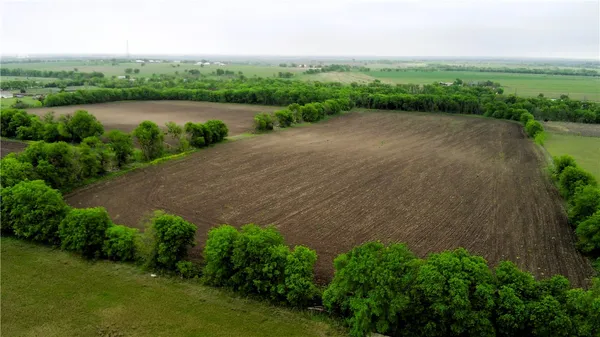a view of a lake with a big yard