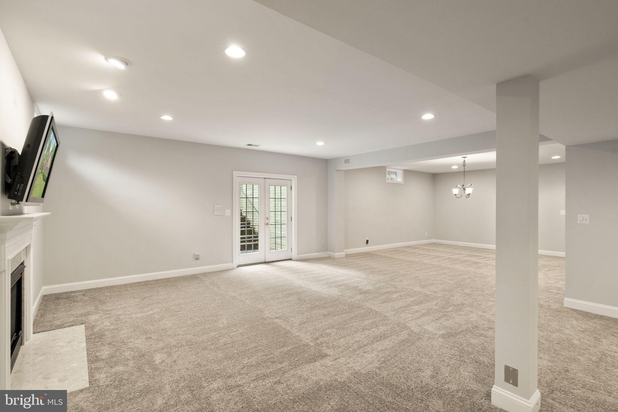 12219 Popes Head Road Fairfax, VA 22030 - Photo 54 of 65 Basement entertaining area