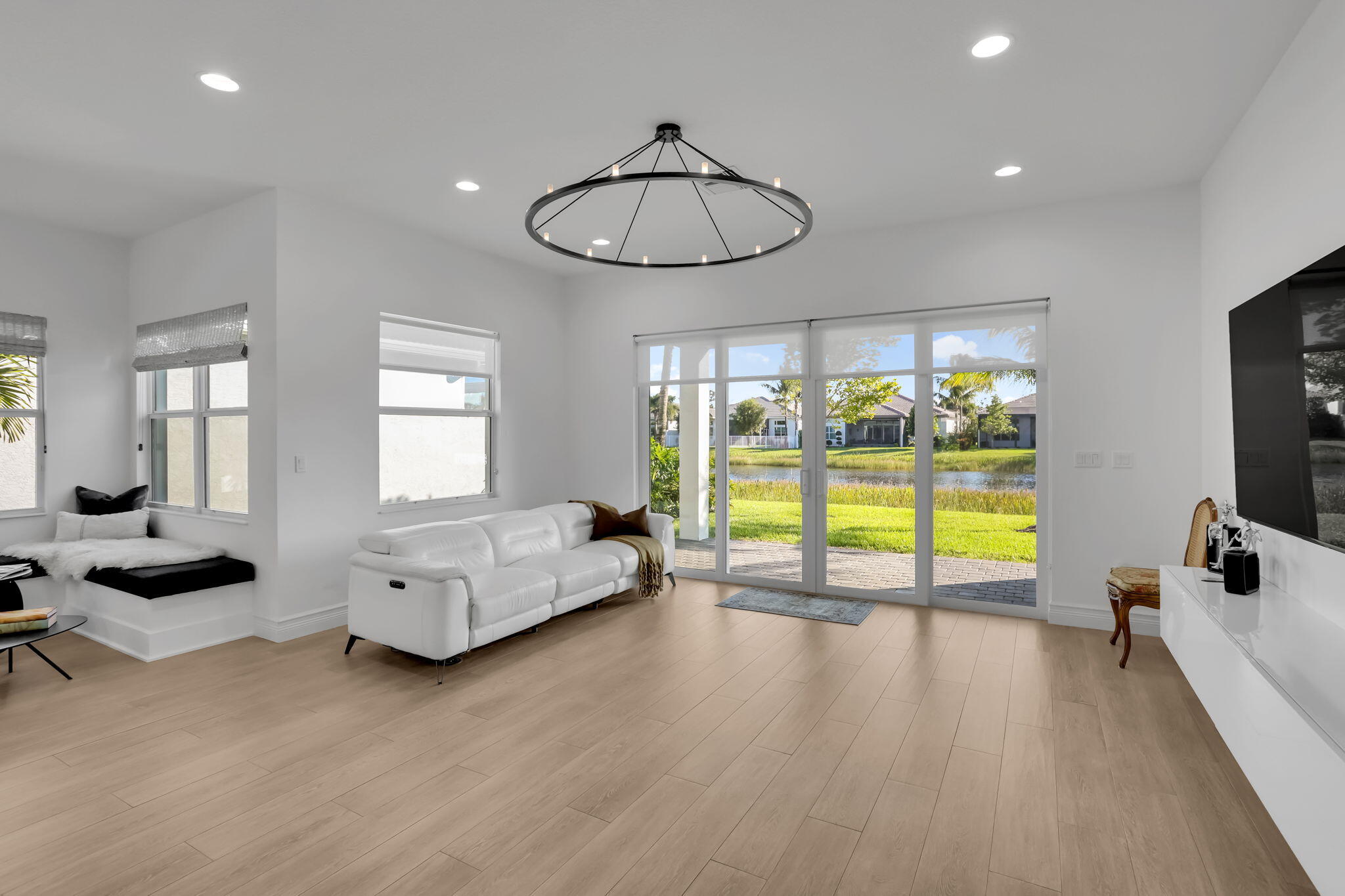 8254 Appalachian Ridge Road Boynton Beach, FL 33473 - Photo 15 of 50 a living room with furniture and a flat screen tv