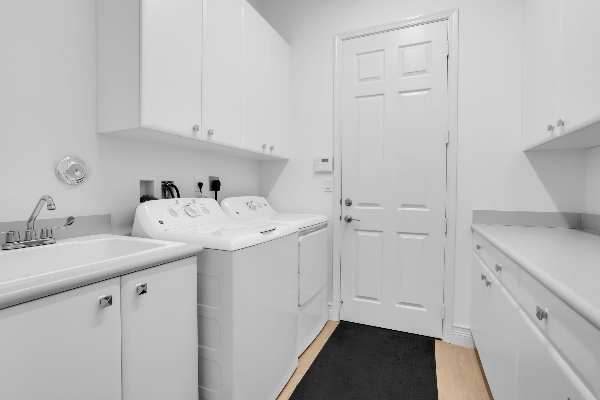 8254 Appalachian Ridge Road Boynton Beach, FL 33473 - Photo 25 of 50 a utility room with sink dryer and washer