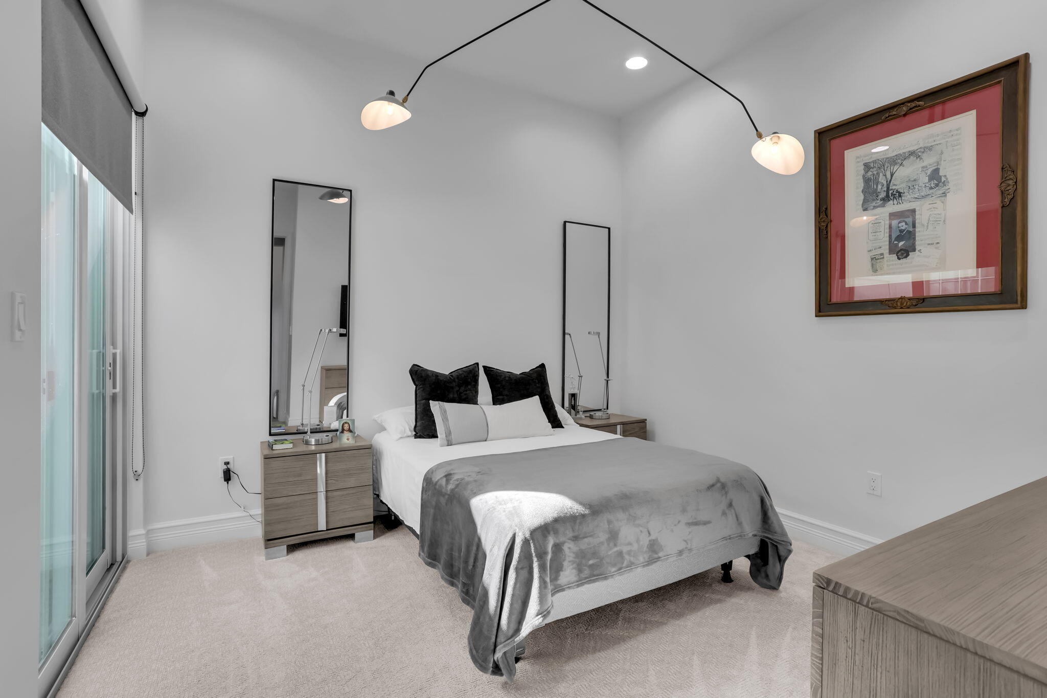 8254 Appalachian Ridge Road Boynton Beach, FL 33473 - Photo 28 of 50 a bedroom with a bed and a painting on the wall