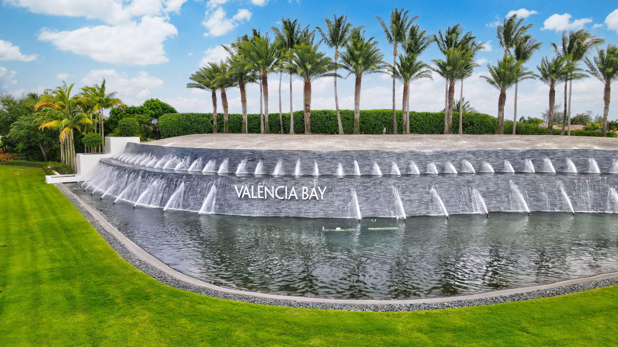 8254 Appalachian Ridge Road Boynton Beach, FL 33473 - Photo 36 of 50 a view of a swimming pool with a garden