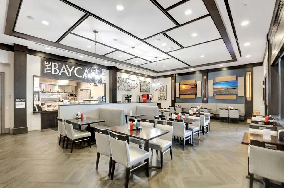 8254 Appalachian Ridge Road Boynton Beach, FL 33473 - Photo 43 of 50 a outdoor space with lots of tables a dining table and chairs