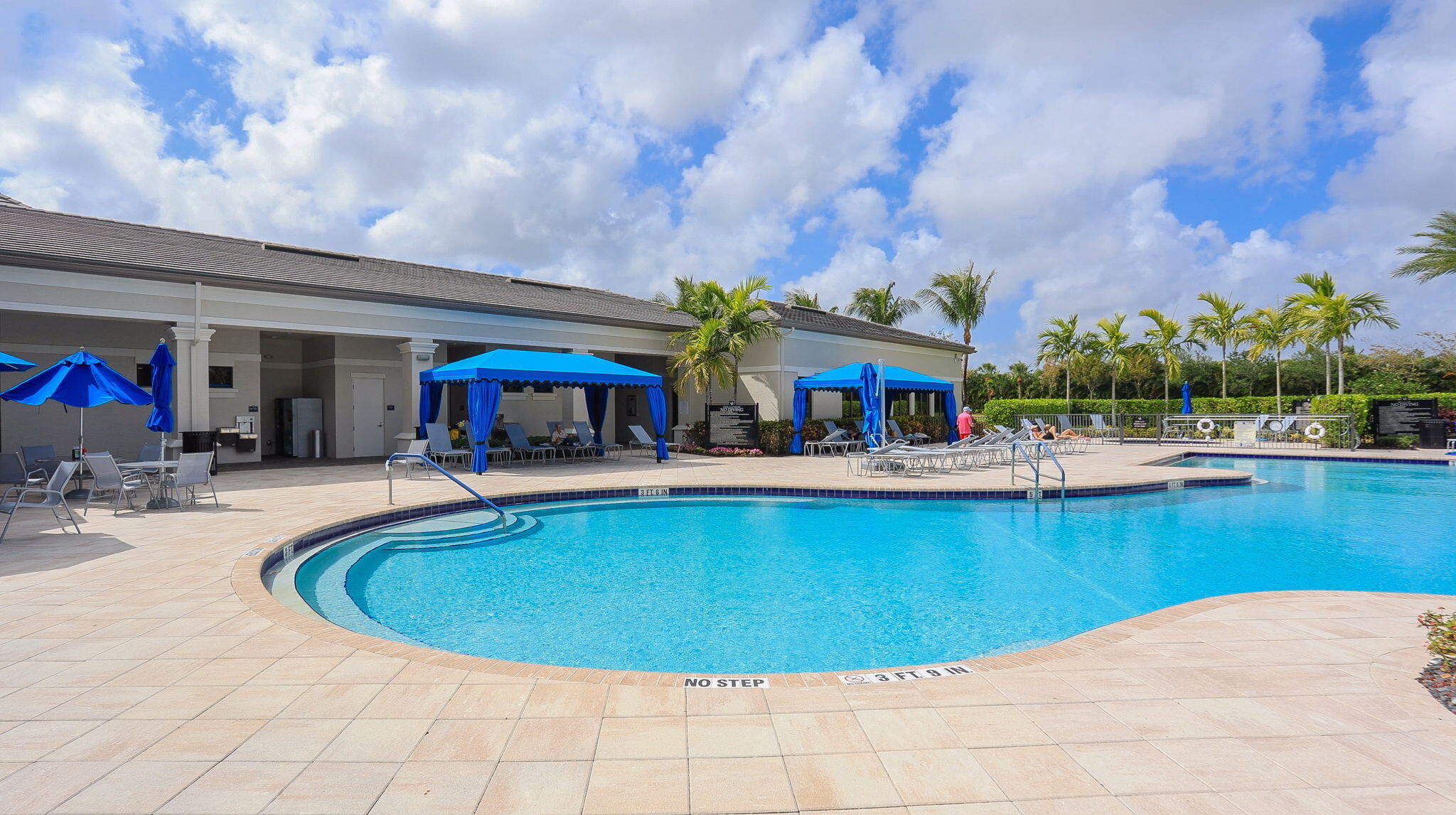 8254 Appalachian Ridge Road Boynton Beach, FL 33473 - Photo 46 of 50 a view of a swimming pool with outdoor seating