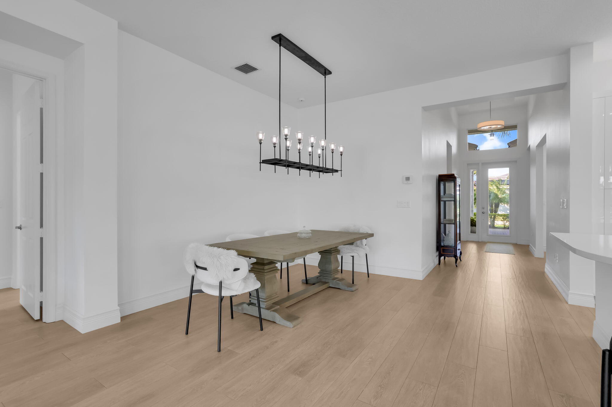 8254 Appalachian Ridge Road Boynton Beach, FL 33473 - Photo 8 of 50 a view of a room with furniture and wooden floor