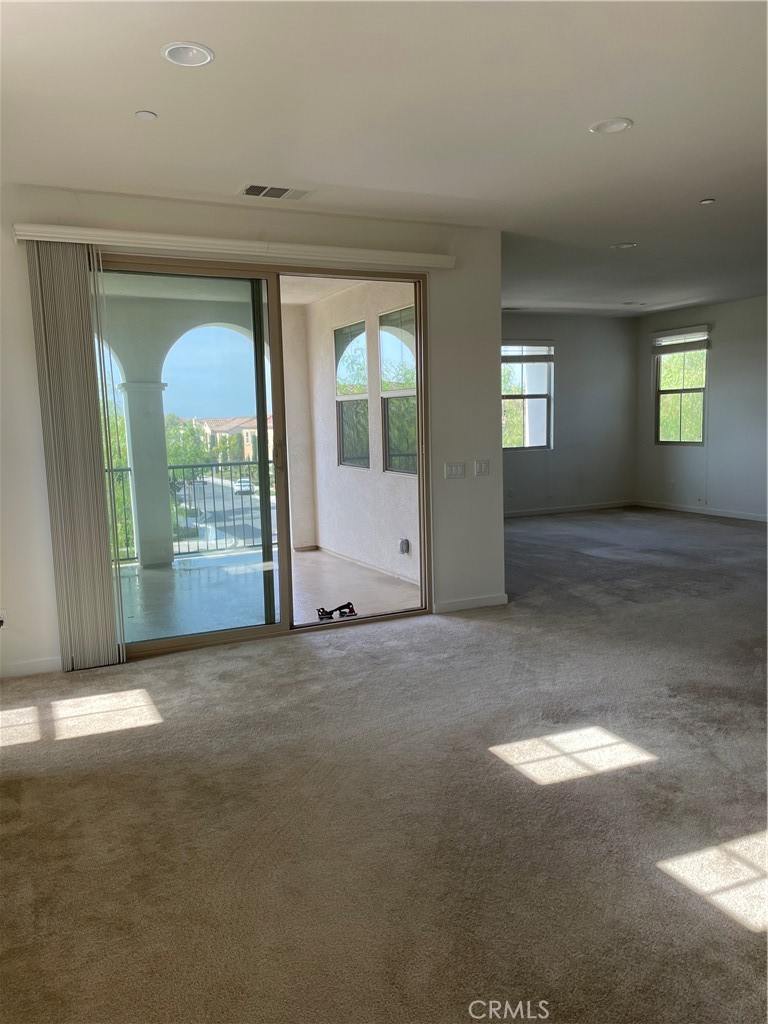 609 Trailblaze Irvine, CA 92618 - Photo 11 of 29 an empty room with windows