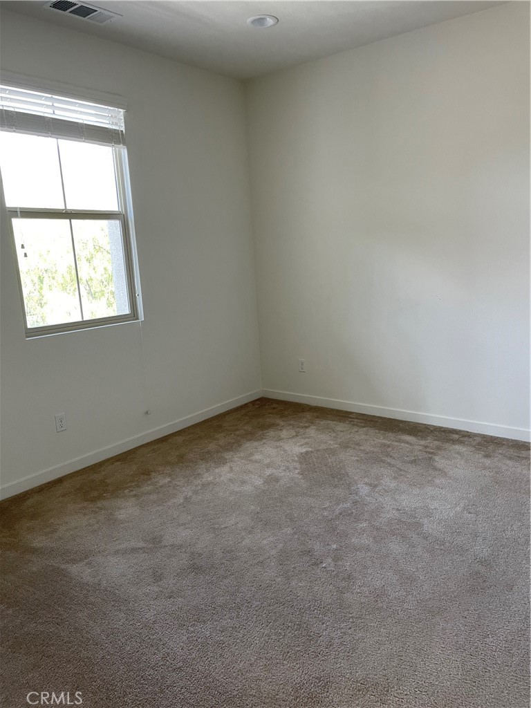 609 Trailblaze Irvine, CA 92618 - Photo 17 of 29 an empty room with a window